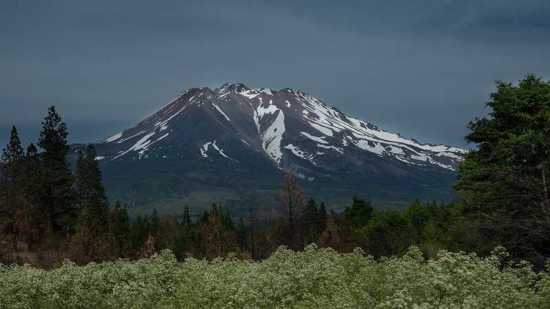 Snow-capped Mountain Peak — Green, Dramatic, Photograph