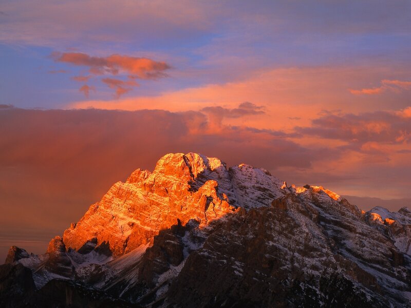 Snow-capped Mountain Peak — Sunset