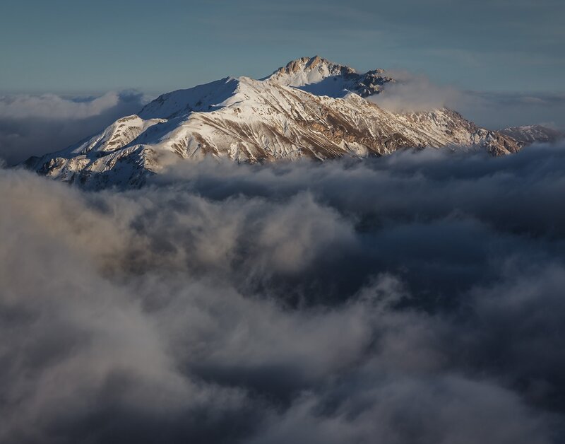 Snow-capped Mountain Peak — White, Dramatic, Morning
