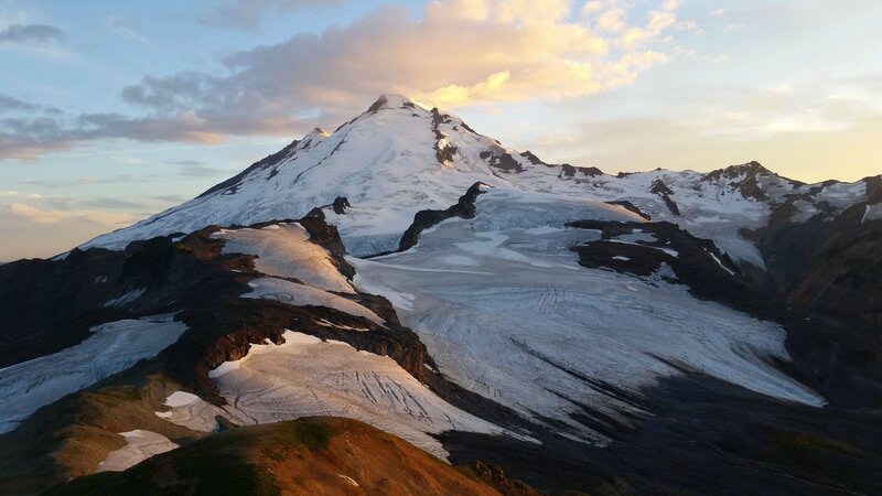 Snow-capped Mountain Peak — White, Serene, Sunrise