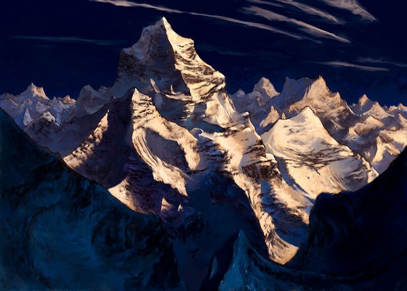 Snow-capped mountain peaks at dusk