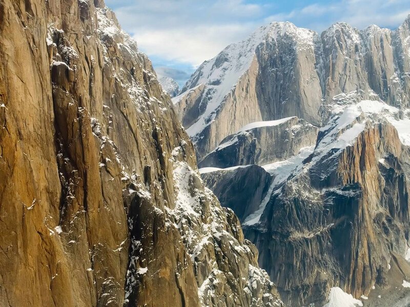 Snow-capped Mountain Peaks — Brown
