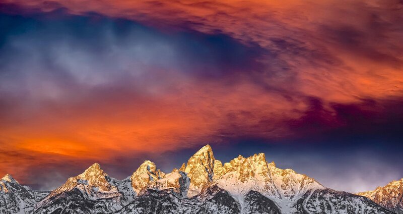 Snow-capped Mountain Peaks — Orange, Dramatic