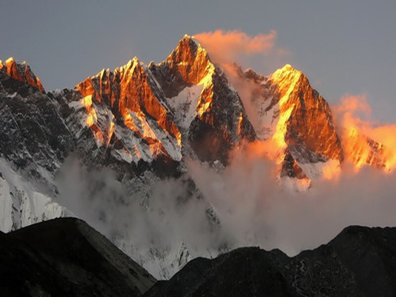 Snow-capped Mountain Peaks — Orange