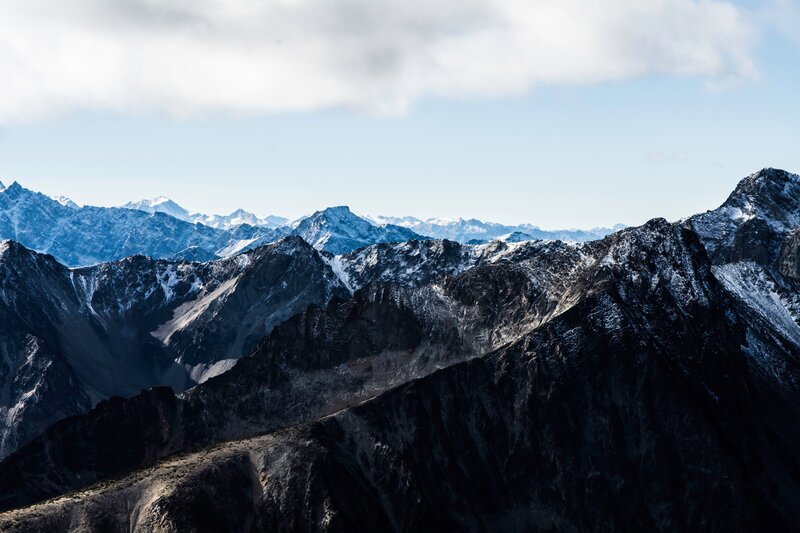 Snow-capped Mountain Range — Blue, Dramatic, Afternoon, Photograph, Mountains, Sky