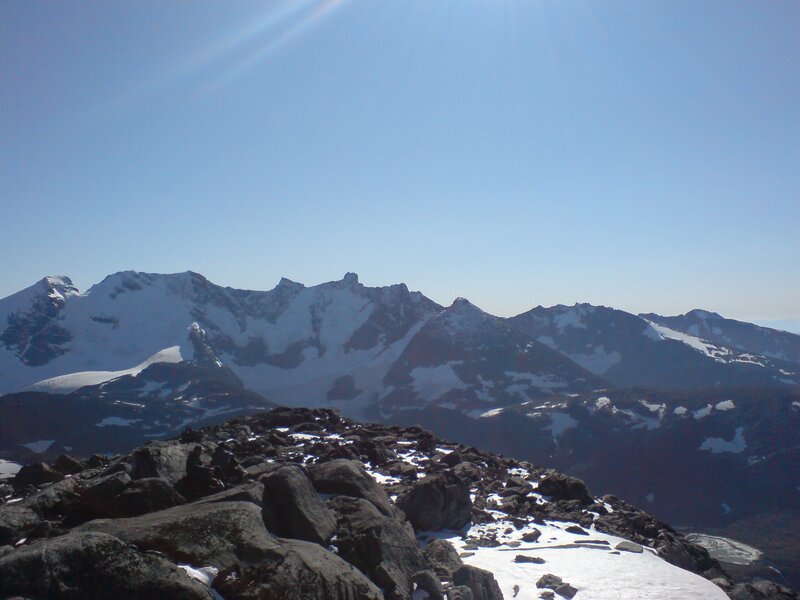 Snow-capped Mountain Range — Blue, Serene, Afternoon, Photograph, Rocks