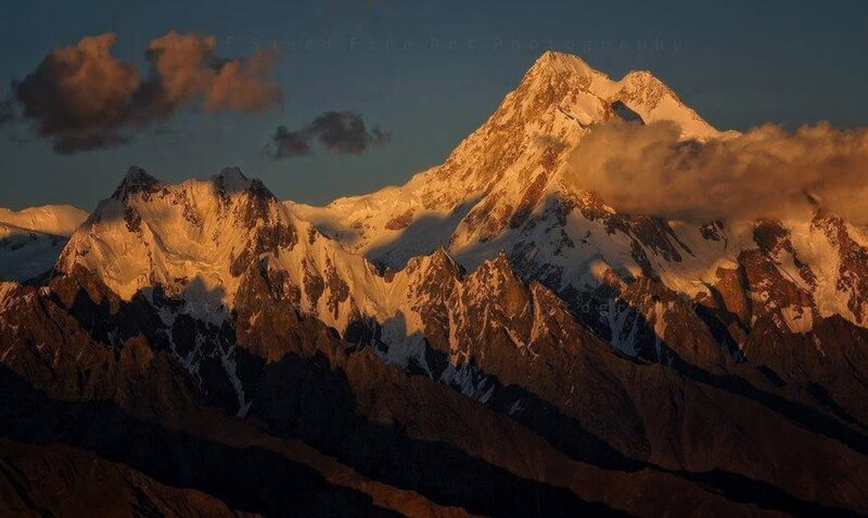 Snow-capped Mountain Range — Brown, Dramatic