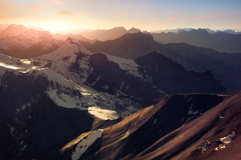 Snow-capped Mountain Range — Orange, Serene, Sunset