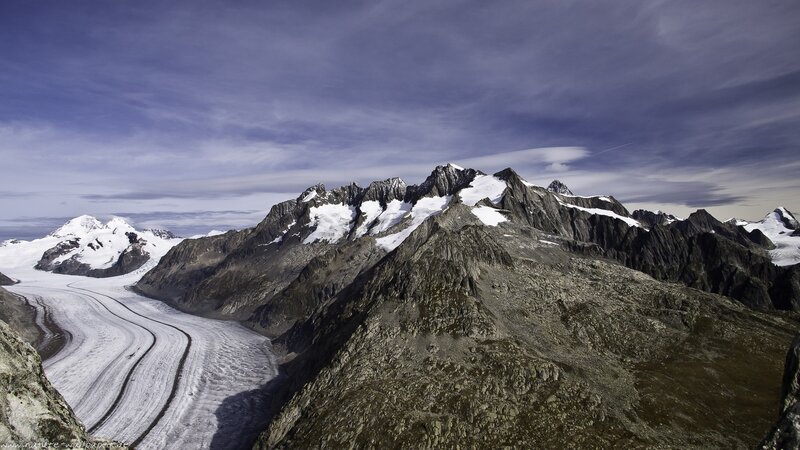 snow-capped mountain range with glacier