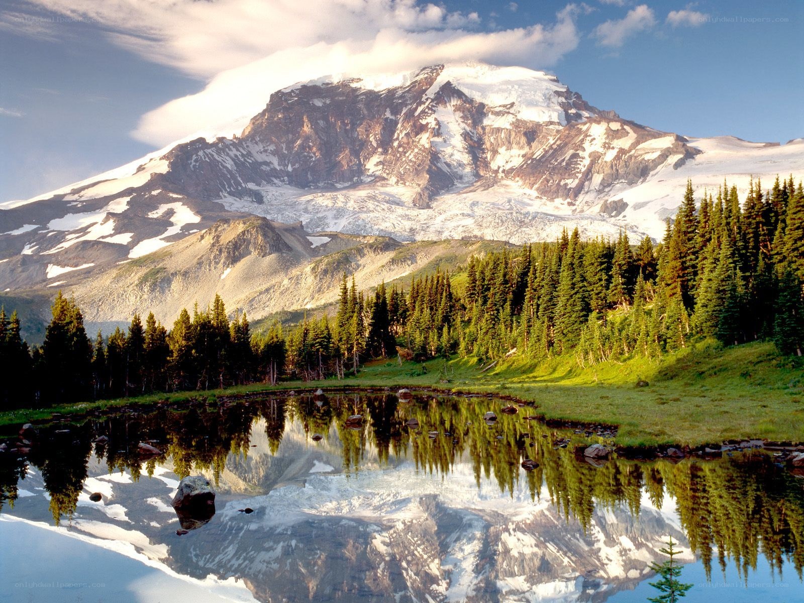Snow-capped mountain reflected in a lake