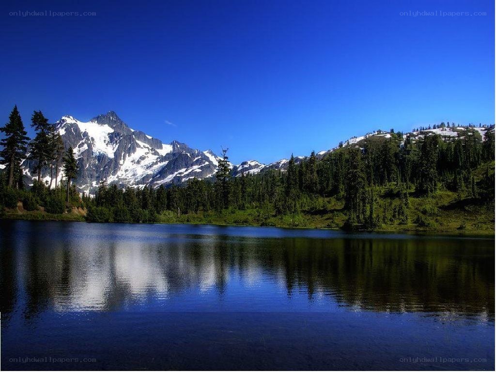 Snow-capped mountain reflected in a lake