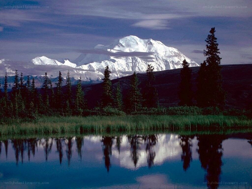 Snow-capped mountain reflected in a lake
