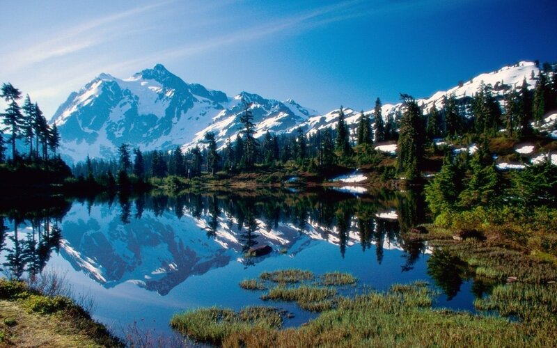 Snow-capped mountain reflected in a lake