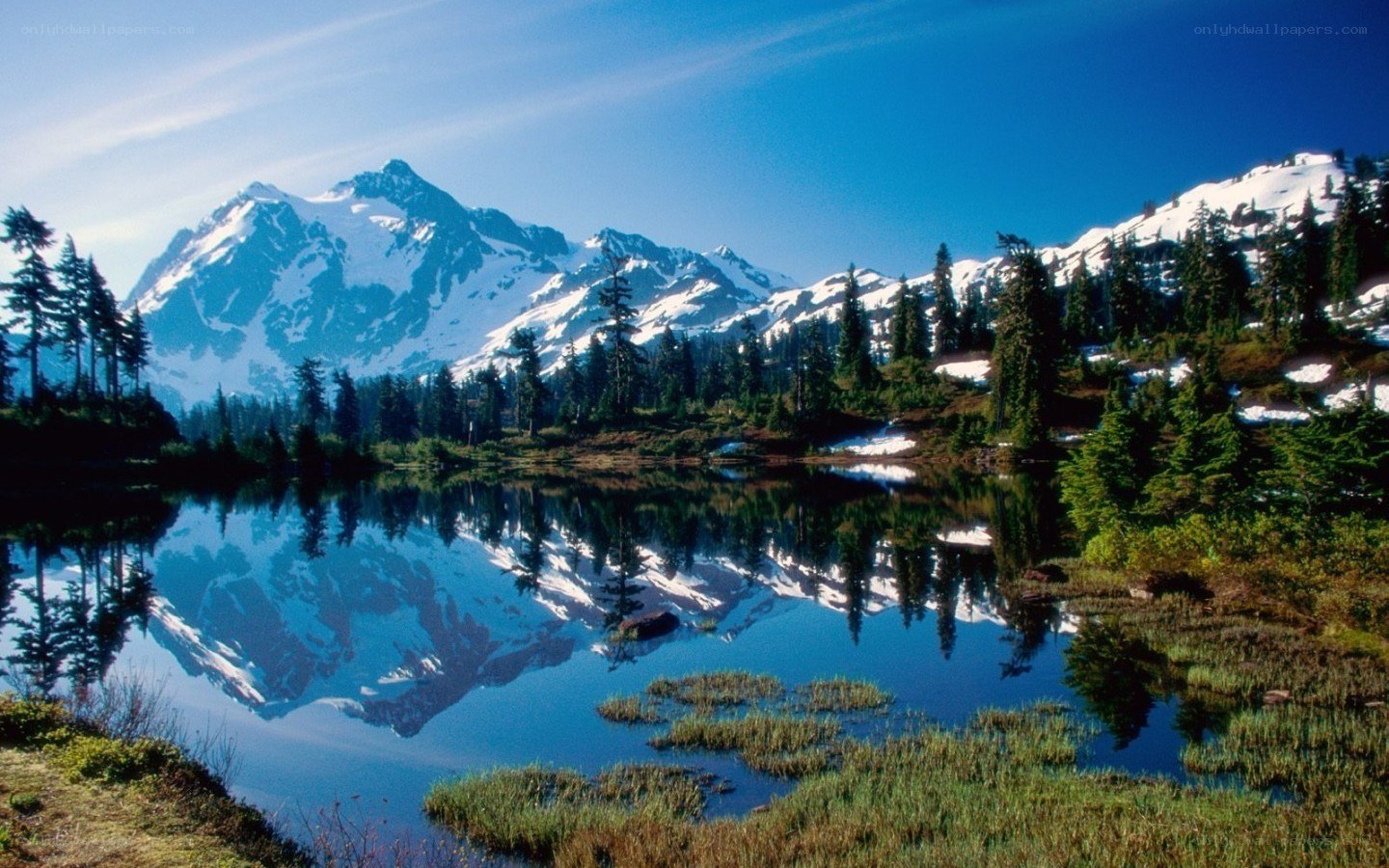 Snow-capped mountain reflected in a lake