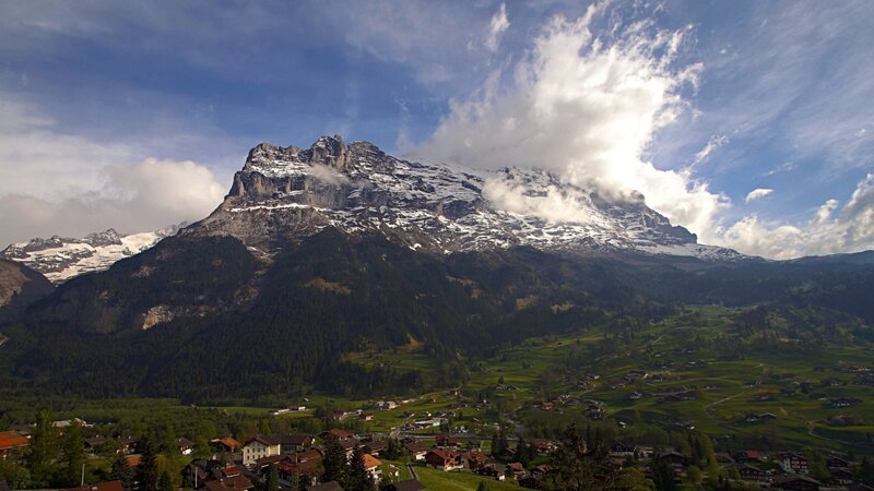 Snow-capped Mountain Village — Green