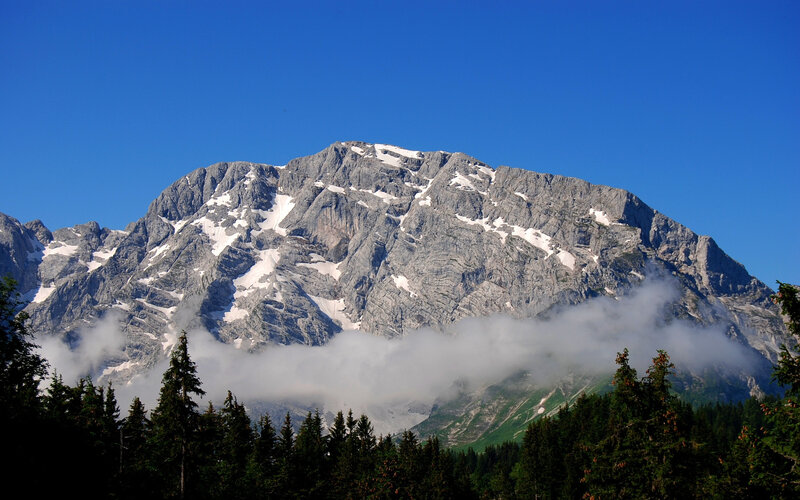 Snow-capped mountain with clouds