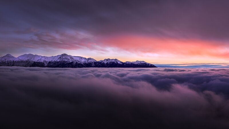 Snow-capped Mountains Above Clouds — Purple