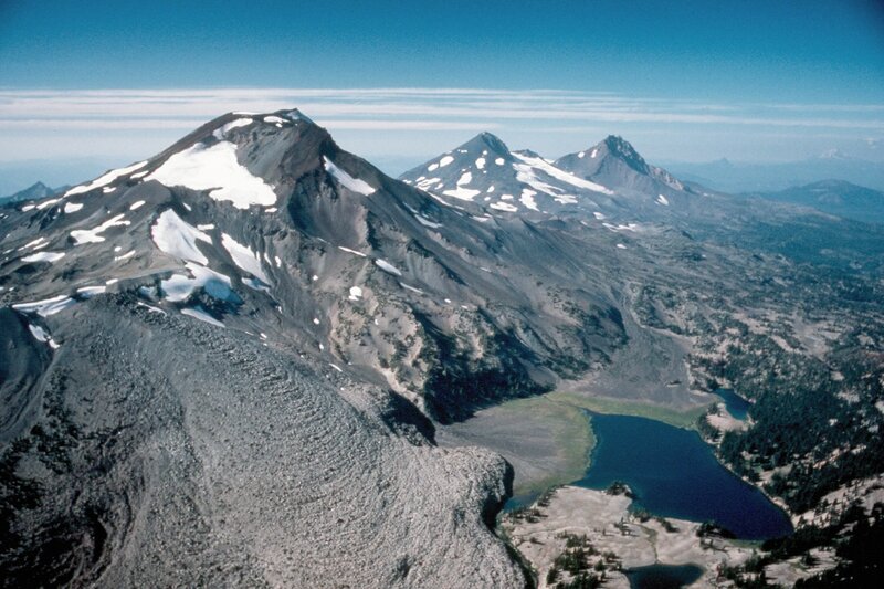 snow-capped mountains and alpine lake