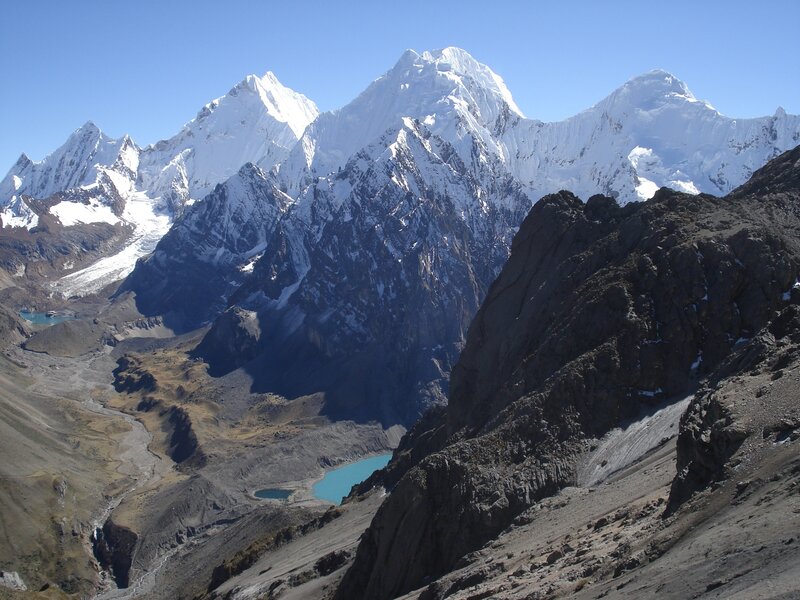snow-capped mountains and alpine lakes