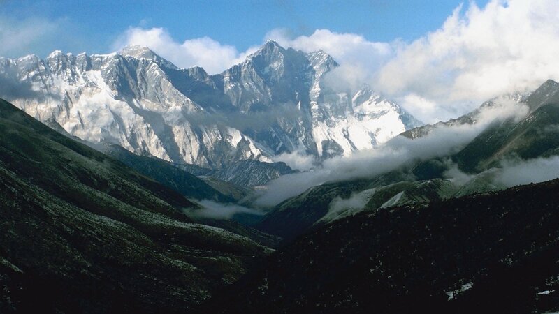 snow-capped mountains and clouds