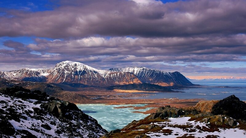 snow-capped mountains and icy bay