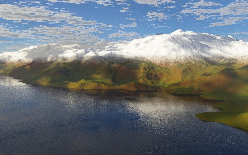 snow-capped mountains and lake