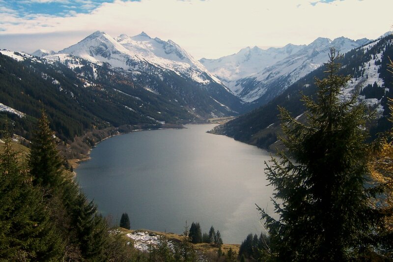 snow-capped mountains and lake