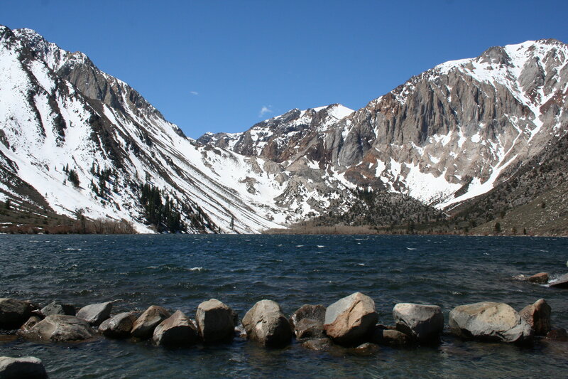 Snow-capped mountains and lake