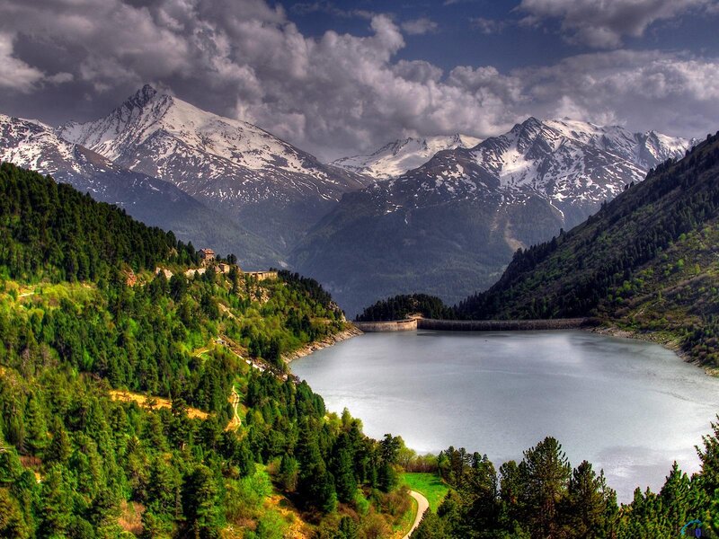 Snow-capped Mountains and Lake — Green, Dramatic, Afternoon, Photograph, Dam