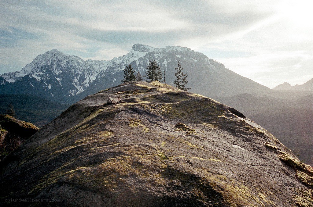 Snow-capped mountains and rocky peak