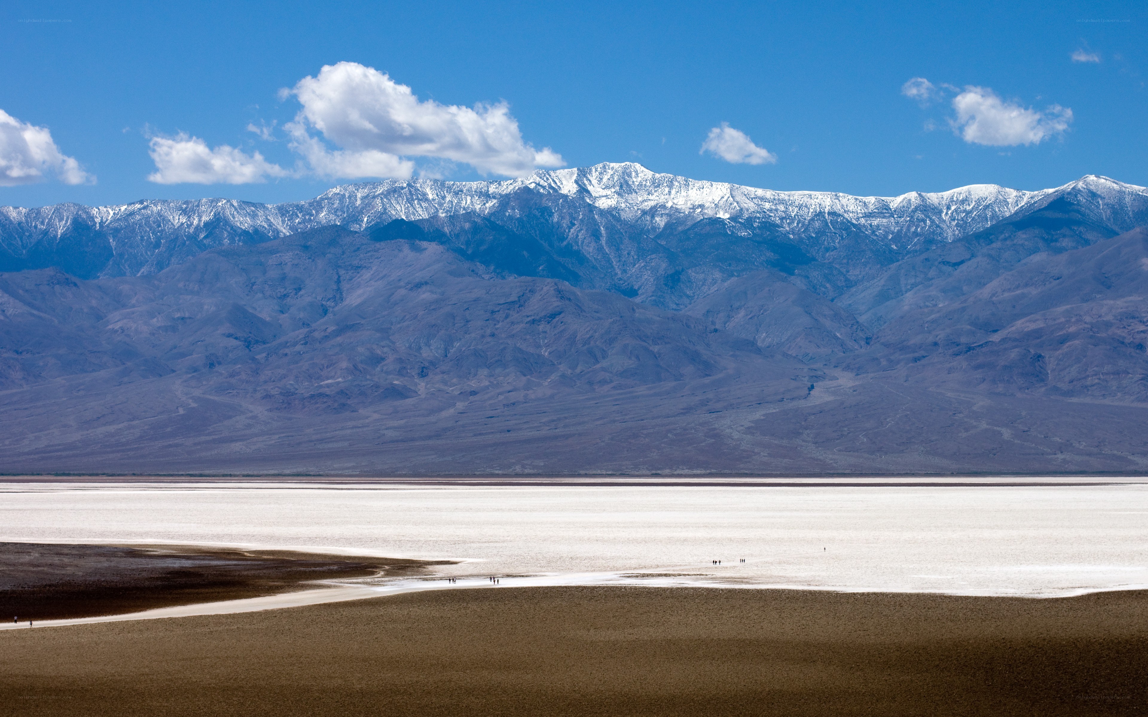 snow-capped mountains and salt flats