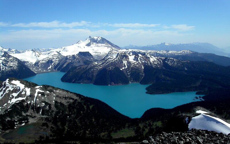 Snow-capped mountains and turquoise lake