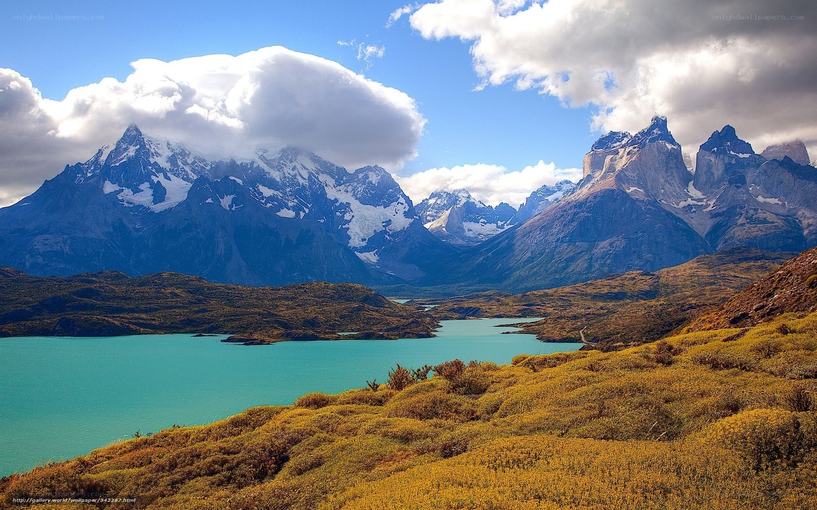 Snow-capped mountains and turquoise lake