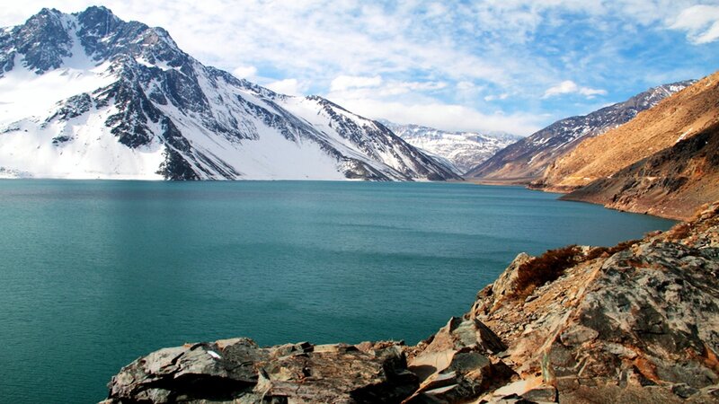 Snow-capped mountains and turquoise lake
