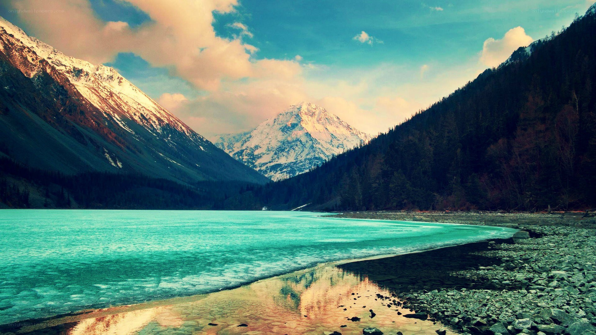 snow-capped mountains and turquoise lake