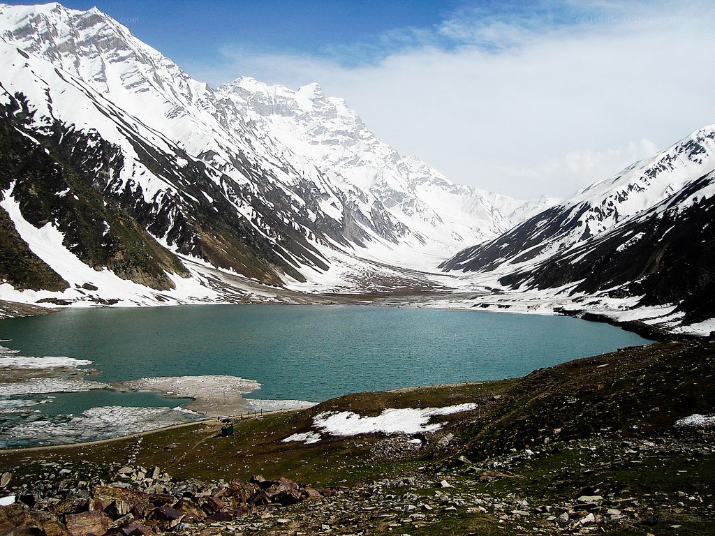 snow-capped mountains and turquoise lake