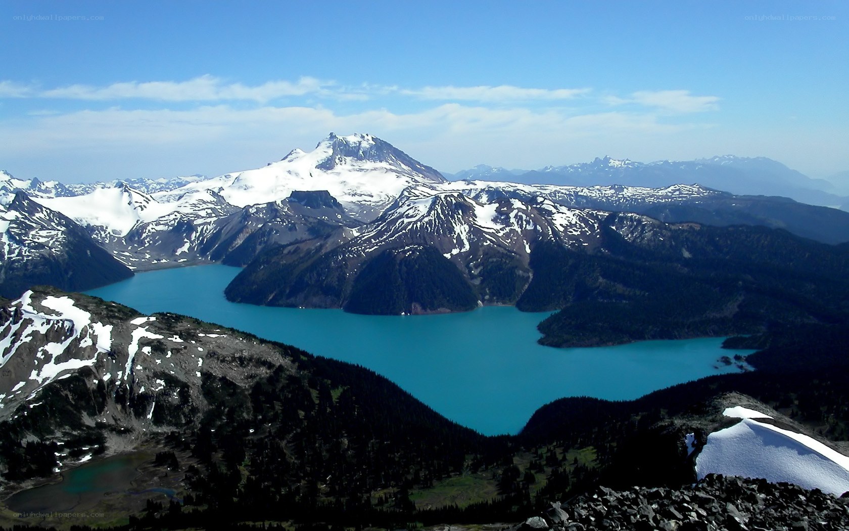 Snow-capped mountains and turquoise lake