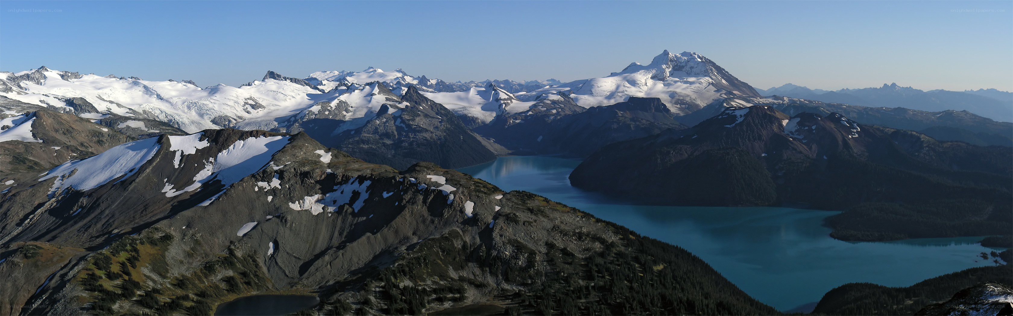 Snow-capped mountains and turquoise lake