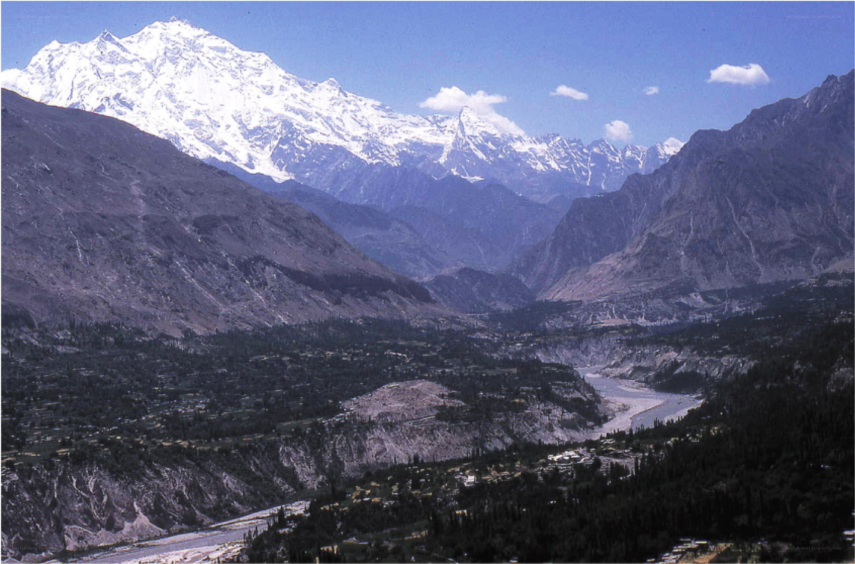 snow-capped mountains and valley