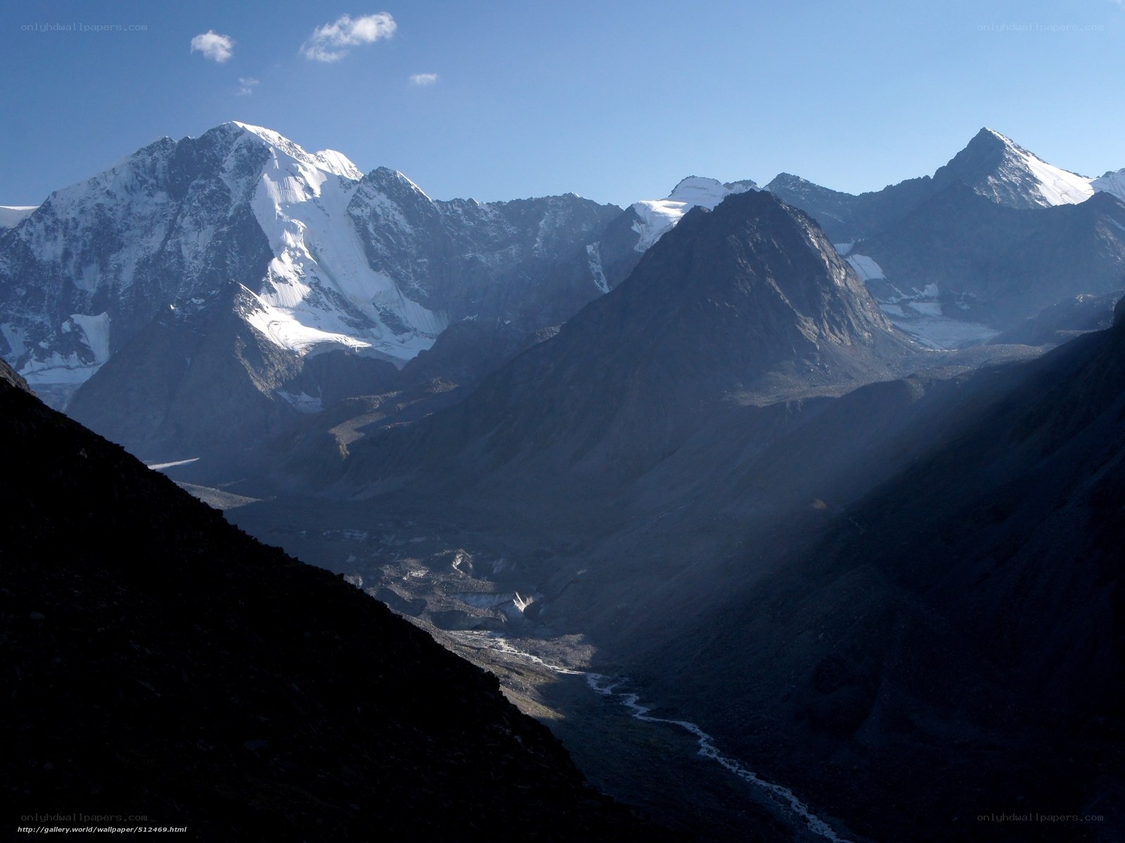 Snow-capped mountains and valley