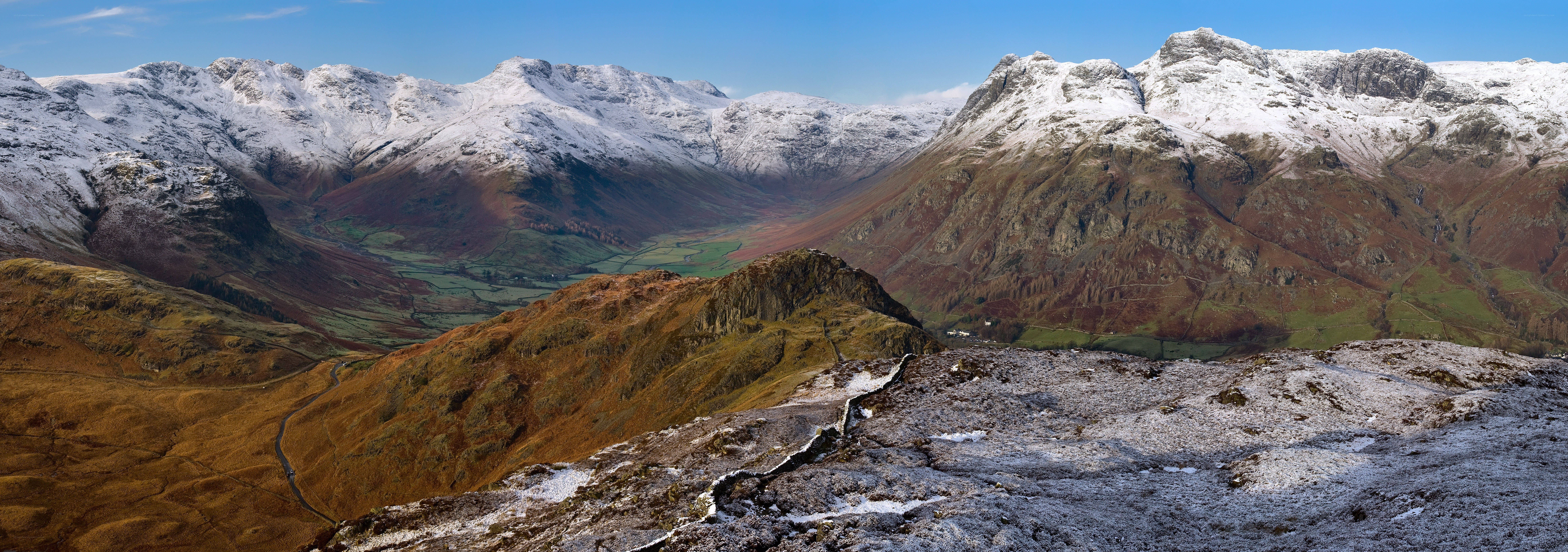 snow-capped mountains and valley