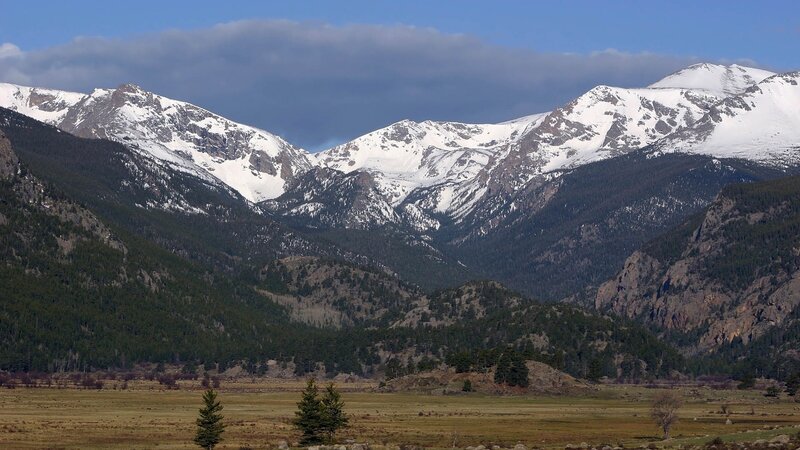 snow-capped mountains and valley