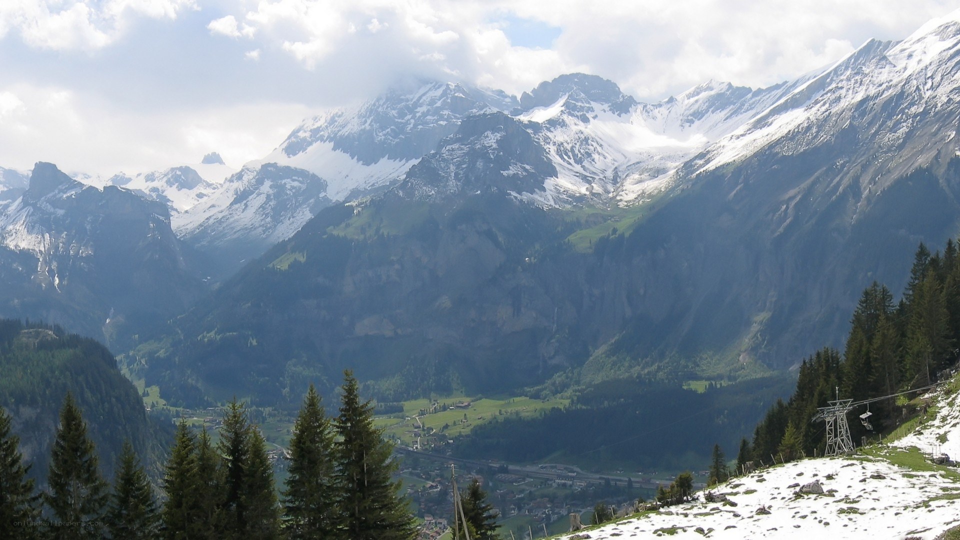 snow-capped mountains and valley