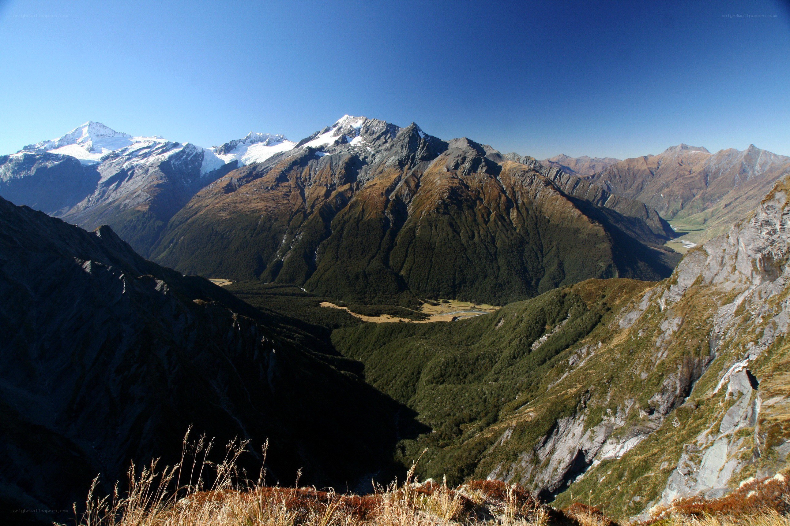 snow-capped mountains and valley
