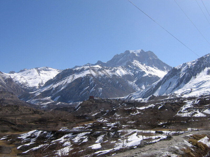 Snow-capped mountains and village