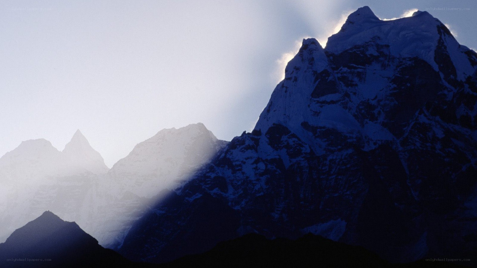 snow-capped mountains at dawn