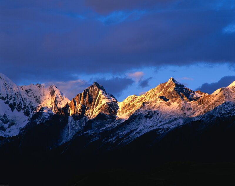 Snow-capped mountains at dawn