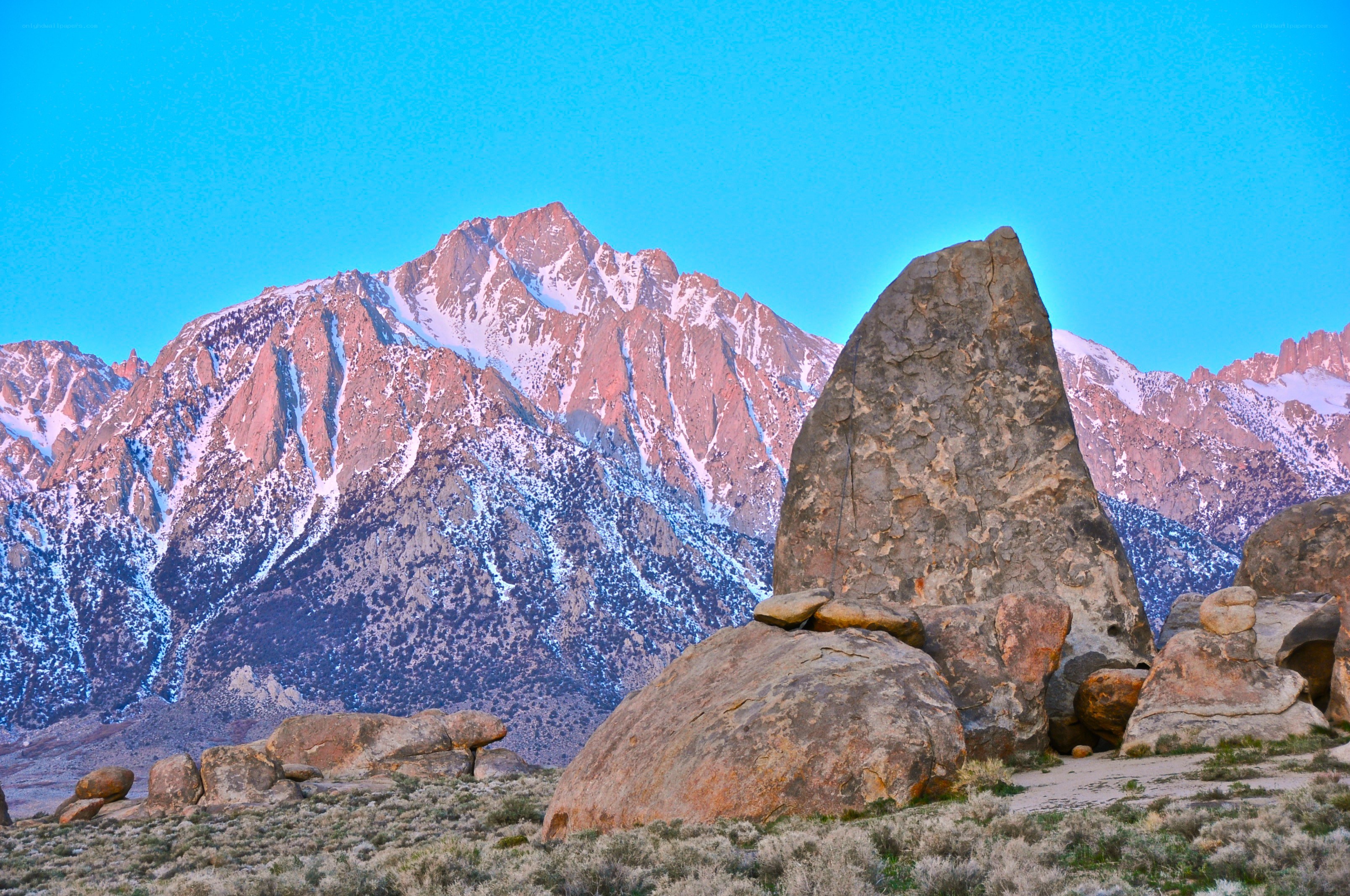 Snow-capped mountains at dawn