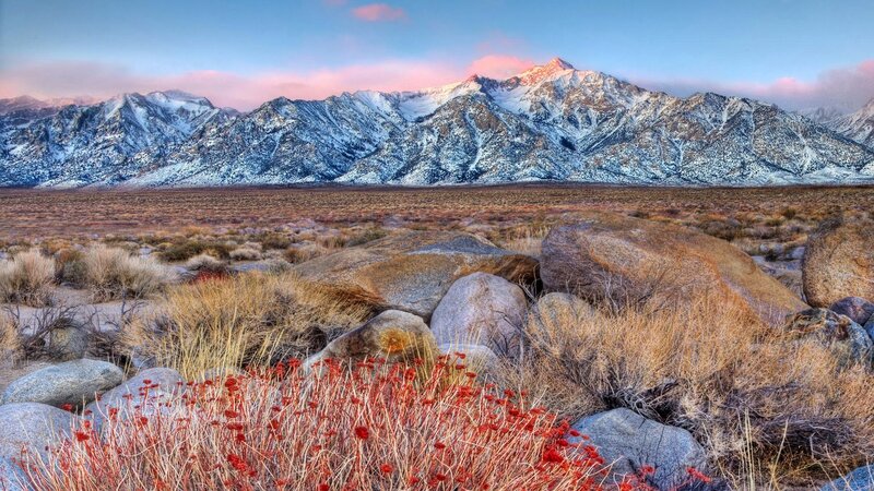 Snow-capped mountains at dawn