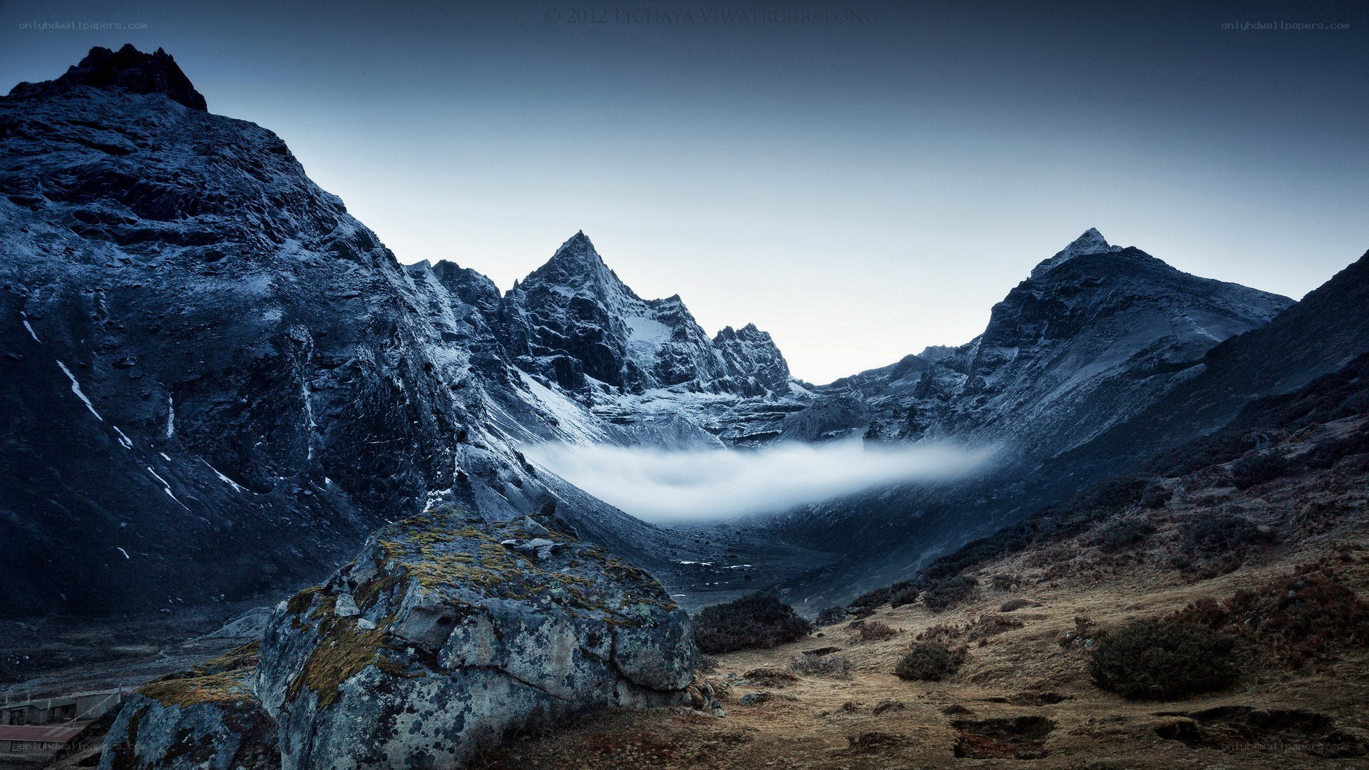 Snow-capped mountains at dawn